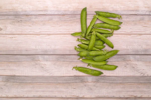 Green Pea Pods Wooden Background — Stock Photo, Image