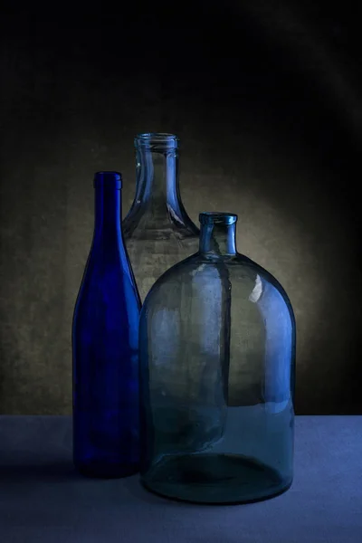 Still Life Three Glass Bottles Dark Background — Stock Photo, Image