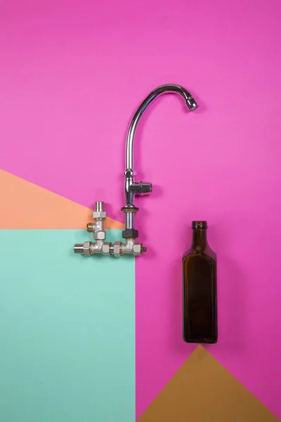 Abstract Still Life Kitchen Faucet Glass Bottle Colored Background — ストック写真