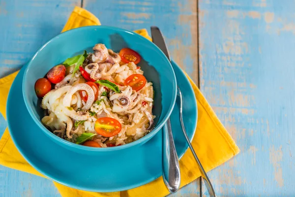 Rice Seafood Dish Blue Bowl Blue Wooden Table Yellow Napkin — Stock Photo, Image