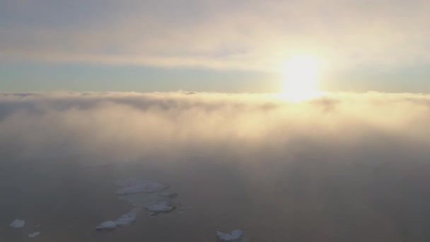 Antártida puesta de sol océano superficie niebla vista aérea — Vídeos de Stock