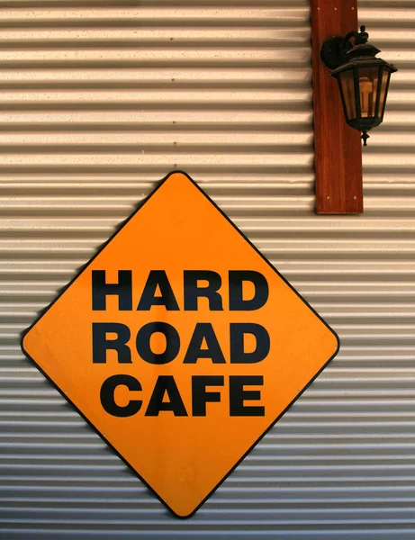 Street Sign Hard Road Cafe Wall Closeup — Stock Photo, Image