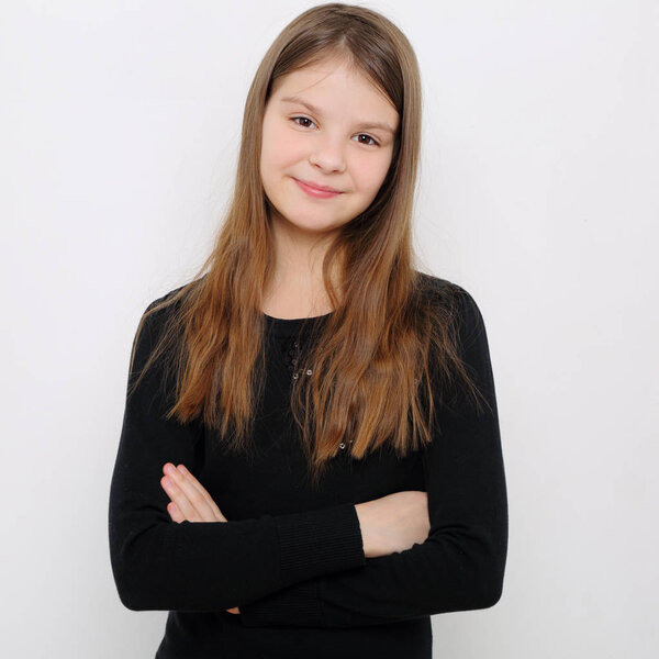 Studio image of lovely emotional caucasian teen girl