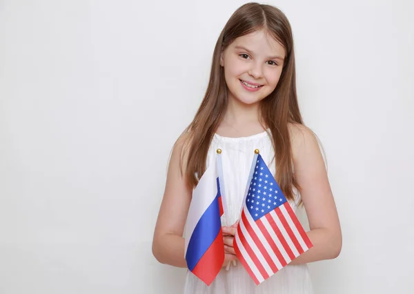 Teen Girl Holding Russian American Flags — Stock Photo, Image