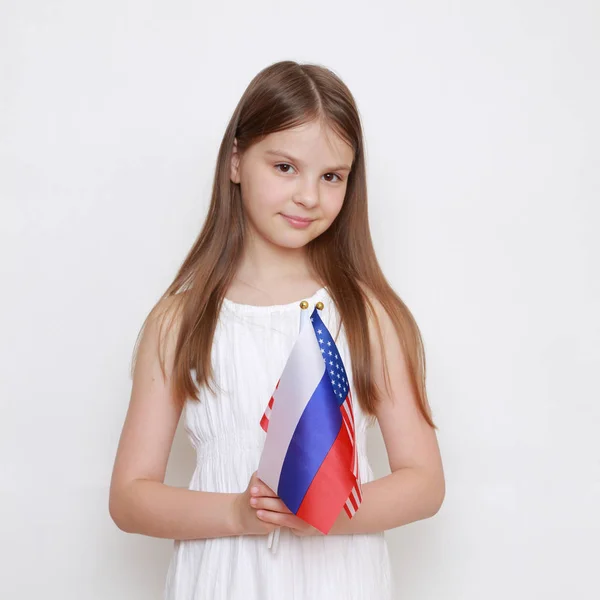 Teen Girl Holding Russian American Flags — Stock Photo, Image