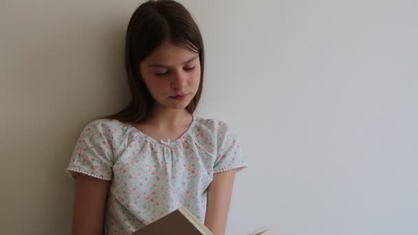 Teen Girl Reading Book — Stock Video