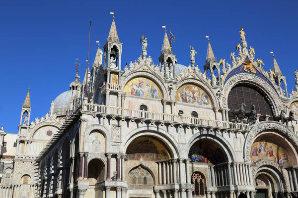 VENICE, ITALY - APRIL 20, 2019: View on St. Mark's Cathedral, Venice, Italy. The cathedral church of Venice since 1807.