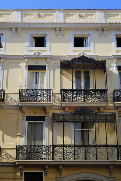 Beautiful old buildings in Valencia, Spain. Interesting architecture details. Siesta. No people.