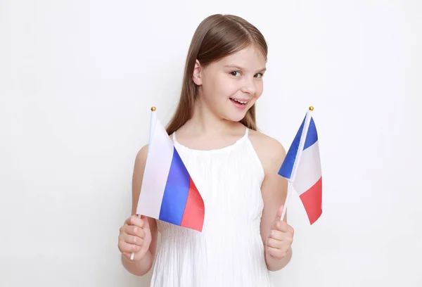 Bambina Con Bandiere Della Federazione Russa Della Francia — Foto Stock