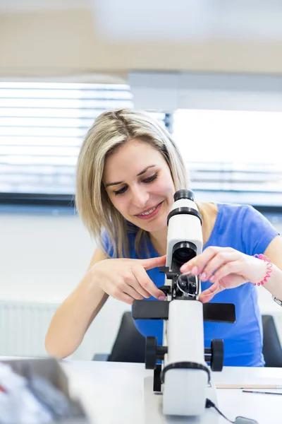 Pretty Female Optometrist Measuring Newly Made Glasses Veryfing Spot — Stock Photo, Image