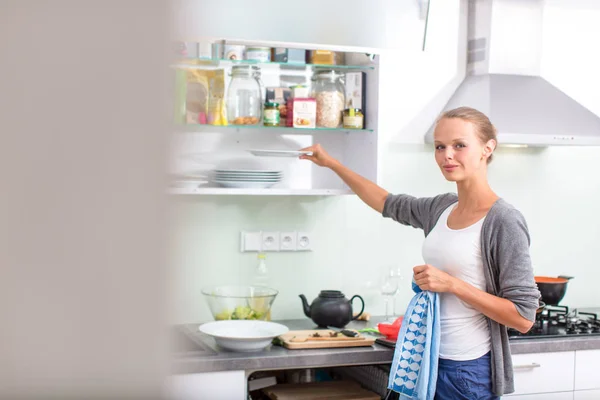 Young Woman Washing Dishes Her Modern Kitchen Using Dishwasher Putting Stock Image