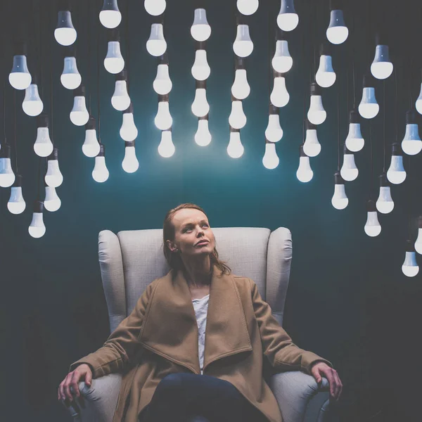 Pensive, young woman having so many ideas for business ventures — Stock Photo, Image