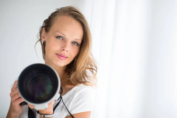 Pretty, female photographer with digital camera — Stock Photo, Image