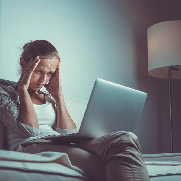 Very tired young woman, burning the midnigh oil — Stock Photo, Image