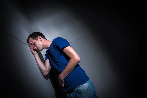 Young Man Suffering Severe Belly Pain Being Cornered Debilitating Condition — Stock Photo, Image