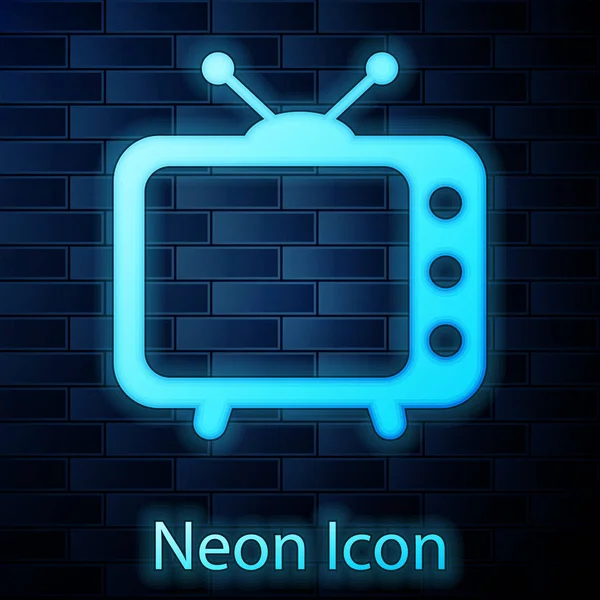 Gloeiende neon Tv pictogram geïsoleerd op bakstenen muur achtergrond. Televisie teken. Vectorillustratie — Stockvector