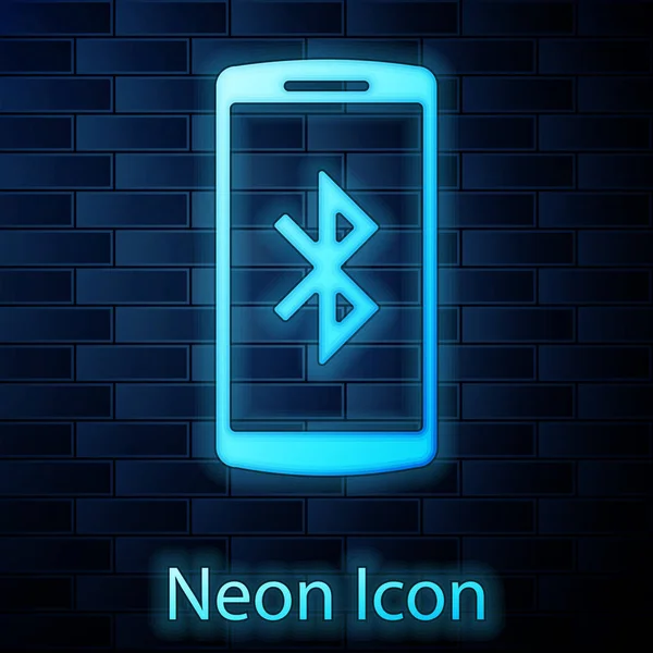 Tuğla duvar arka plan üzerinde izole bluetooth simgesi simgesi olan parlak neon Smartphone. Vektör çizim — Stok Vektör