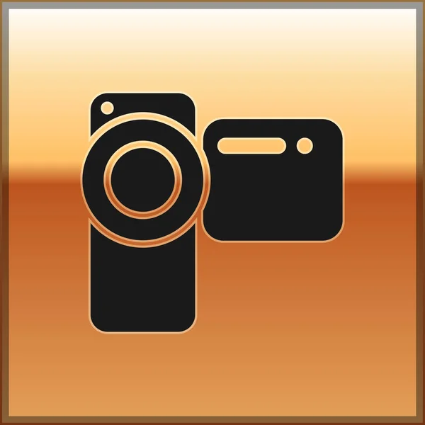Schwarze Kinokamera-Ikone isoliert auf goldenem Hintergrund. Videokamera. Filmschild. Filmprojektor. Vektorillustration — Stockvektor