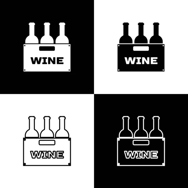 Mettre les bouteilles de vin dans une boîte en bois icônes isolées sur fond noir et blanc. Bouteilles de vin dans une icône de caisse en bois. Ligne, contour et icône linéaire. Illustration vectorielle — Image vectorielle