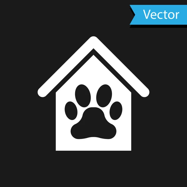 Casa de perro blanco e icono de mascota de impresión de pata aislado sobre fondo negro. Una perrera. Ilustración vectorial — Vector de stock