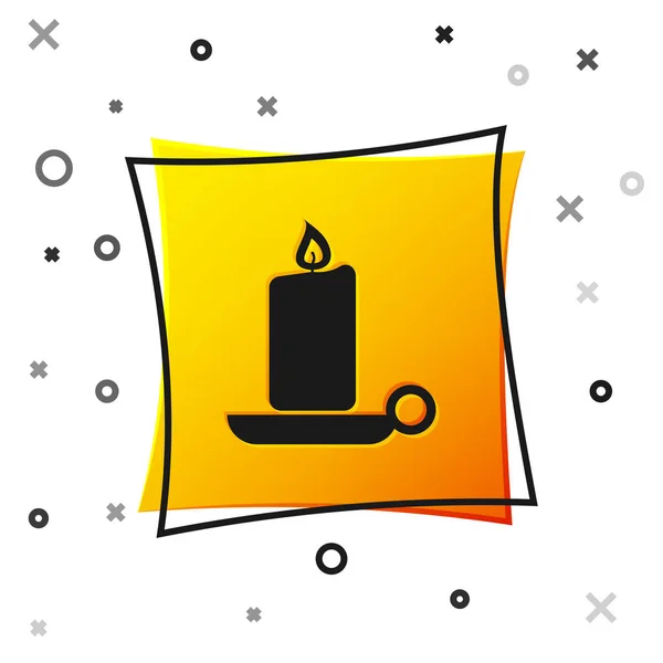 Black Burning candle in candlestick icon isolated on white background. Old fashioned lit candle. Cylindrical aromatic candle stick with burning flame. Yellow square button. Vector Illustration — Stock Vector