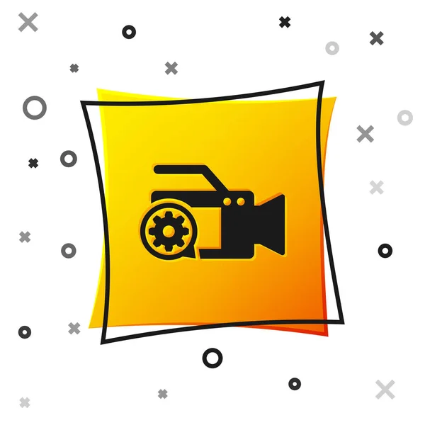 Black Video camera and gear icon isolated on white background. Adjusting app, service concept, setting options, maintenance, repair, fixing. Yellow square button. Vector Illustration — Stock Vector