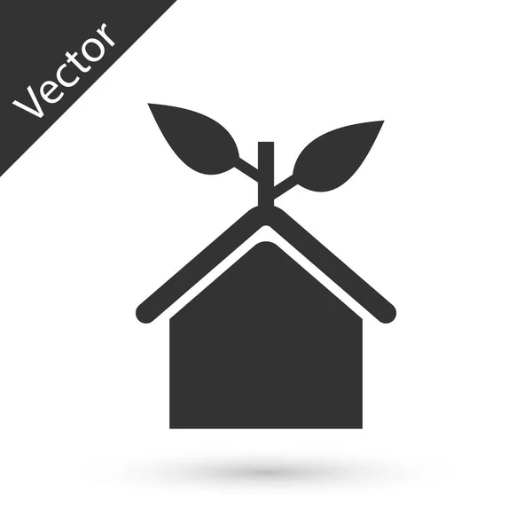Иконка серого экологически чистого дома изолирована на белом фоне. Эко-дом с листьями. Векторная миграция — стоковый вектор