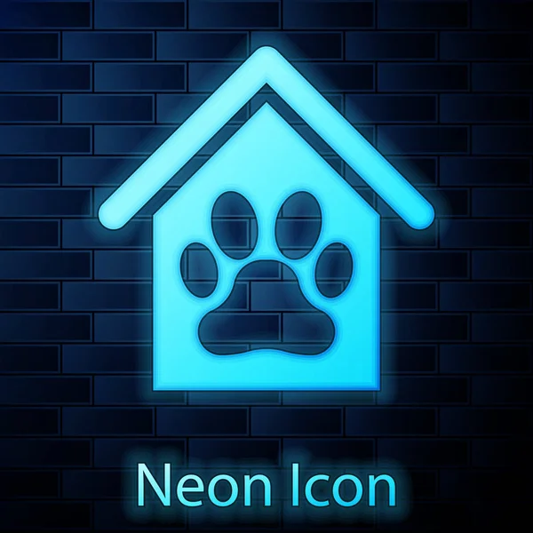 Brilhante neon Dog house and paw print pet icon isolado no fundo da parede de tijolo. Canil de cão. Ilustração vetorial —  Vetores de Stock