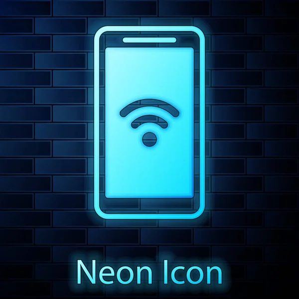 Smartphone de neón brillante con Wi-Fi gratis icono de conexión inalámbrica aislado en el fondo de la pared de ladrillo. Tecnología inalámbrica, conexión wi-fi, red inalámbrica. Ilustración vectorial — Vector de stock