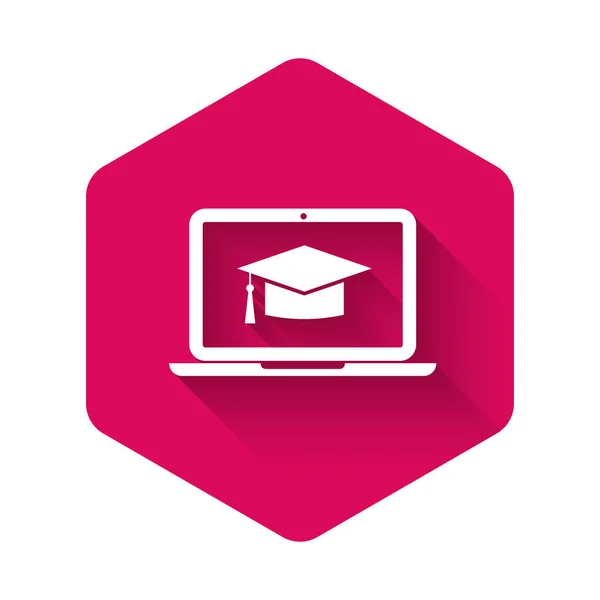 White Graduation cap on screen laptop icon isolated with long shadow. Online learning or e-learning concept. Pink hexagon button. Vector Illustration — Stock Vector