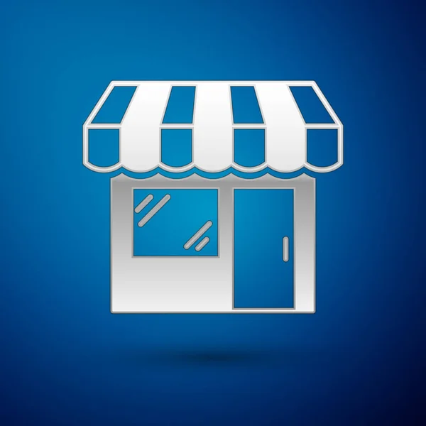 Stříbrný Nákupní budova nebo obchod ikona izolované na modrém pozadí. Výstavba obchodu. Vektorová ilustrace — Stockový vektor