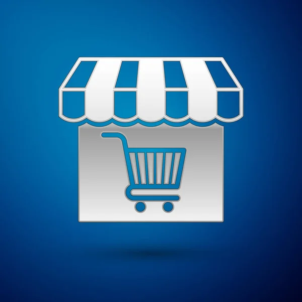 Silbernes Einkaufsgebäude oder Marktgeschäft mit Warenkorb-Symbol auf blauem Hintergrund. Ladenbau. Supermarkt-Warenkorb Symbol. Vektorillustration — Stockvektor