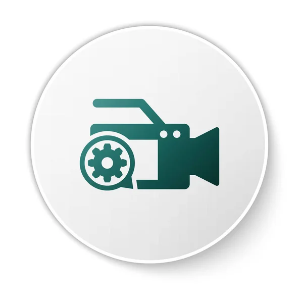 Icono de cámara de vídeo verde y engranaje aislado sobre fondo blanco. Ajustar la aplicación, concepto de servicio, opciones de configuración, mantenimiento, reparación, fijación. Botón círculo blanco. Ilustración vectorial — Vector de stock