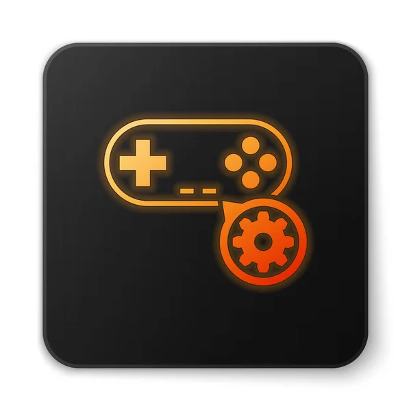 Orange leuchtendes Gamepad und Getriebesymbol isoliert auf weißem Hintergrund. Anpassung App, Servicekonzept, Einstellungsmöglichkeiten, Wartung, Reparatur, Reparatur. schwarzer quadratischer Knopf. Vektorillustration — Stockvektor