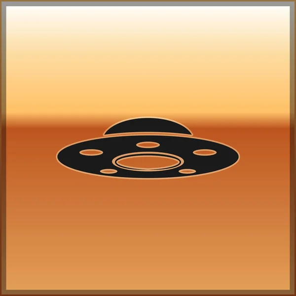 OVNI noir icône de vaisseau volant isolé sur fond or. Soucoupe volante. Un vaisseau spatial extraterrestre. Futuriste inconnu objet volant. Illustration vectorielle — Image vectorielle