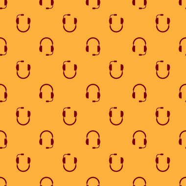 Kahverengi arka planda mikrofon simgesi ile kırmızı Kulaklıklar kesintisiz desen. Kulaklık işareti. Müzik, servis, iletişim ve operatör dinleme için kavram nesnesi. Düz tasarım. Vektör İllüstrasyonu