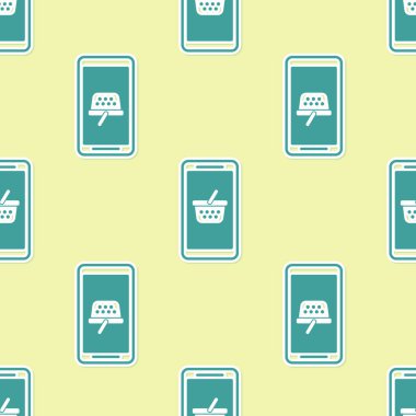 Yeşil Cep telefonu ve alışveriş sepeti simgesi sarı arka plan üzerinde sorunsuz desen izole. Online satın alma sembolü. Süpermarket sepeti sembolü. Vektör İllüstrasyonu