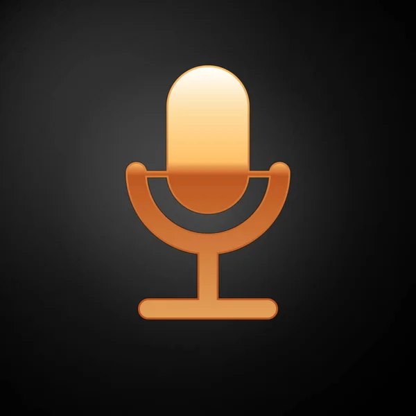 Icono de micrófono dorado aislado sobre fondo negro. En el micrófono de radio de aire. Firma del portavoz. Ilustración vectorial — Vector de stock