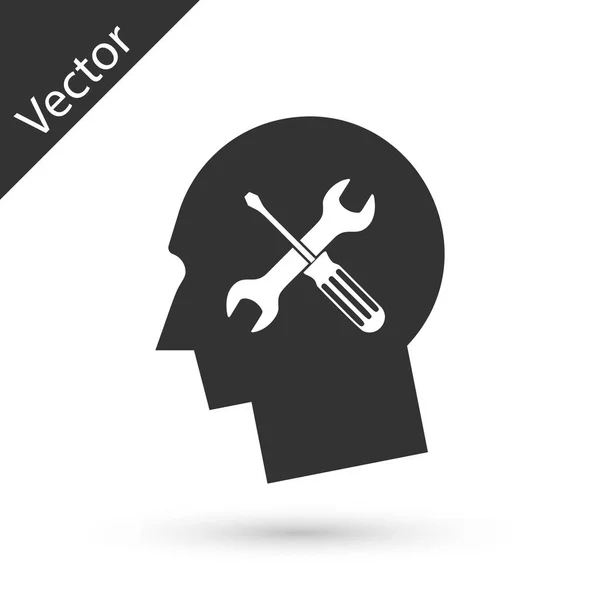 Grey Human head with with with screwdriver and wrench icon isolated o — стоковый вектор