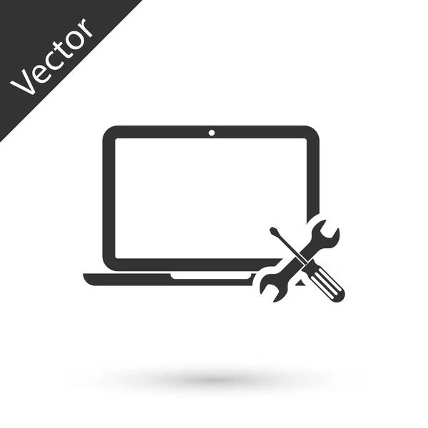 Grey Laptop with screwdriver and wrench icon isolated on white b — Stock Vector