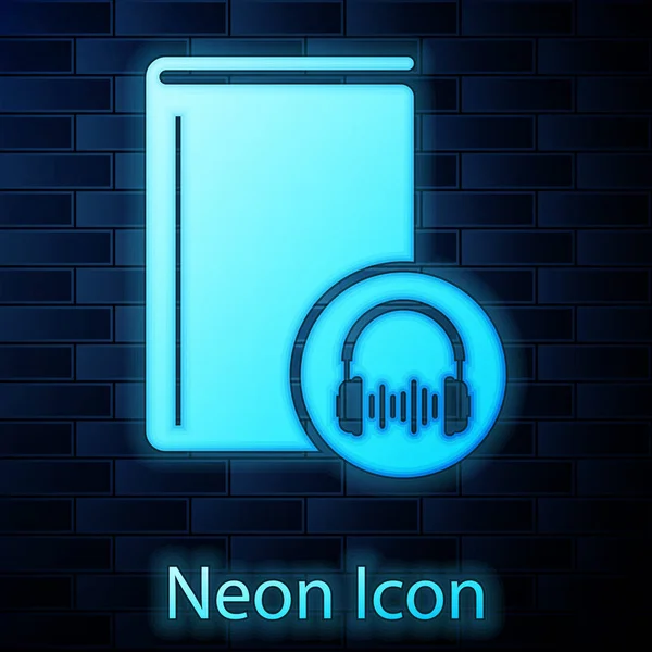 Świecący neon Ikona książki audio izolowane na tle ściany z cegły. Książka ze słuchawkami. Znak przewodnika audio. Koncepcja uczenia się online. Ilustracja wektora — Wektor stockowy