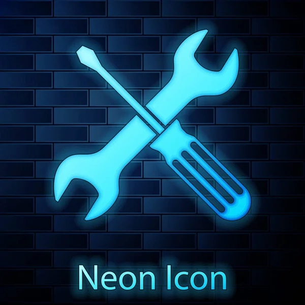 Glowing neon Crossed screwdriver and wrench tools icon isolated on brick wall background. Service tool symbol. Vector Illustration — Stock Vector