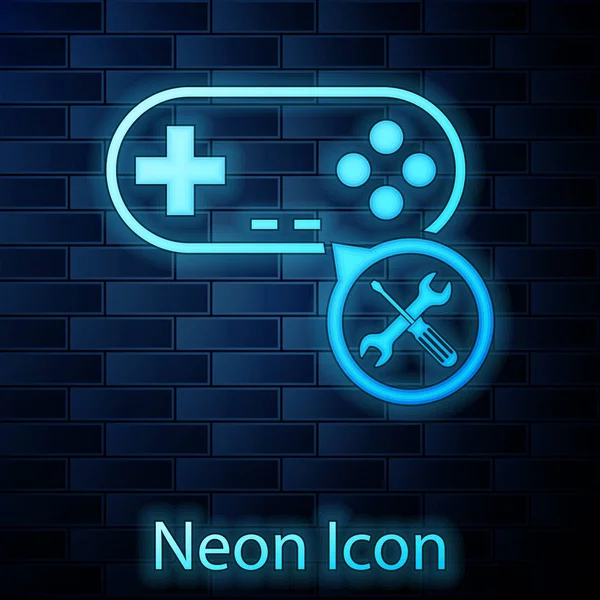 Glühende Neon-Gamepad mit Schraubenzieher und Schraubenschlüssel-Symbol isoliert auf Backstein-Wand-Hintergrund. Anpassung, Service, Einstellung, Wartung, Reparatur, Reparatur. Vektorillustration — Stockvektor