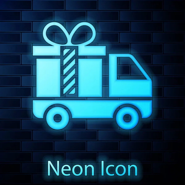 Gloeiende neon levering truck met cadeau icoon geïsoleerd op bakstenen muur achtergrond. Vector illustratie — Stockvector