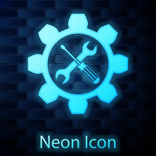 Izzó neon karbantartás szimbólum-csavarkulcs és csavarhúzó a sebességváltó ikon izolált téglafal háttérben. Szolgáltatási eszköz szimbólumát. Vektoros illusztráció — Stock Vector