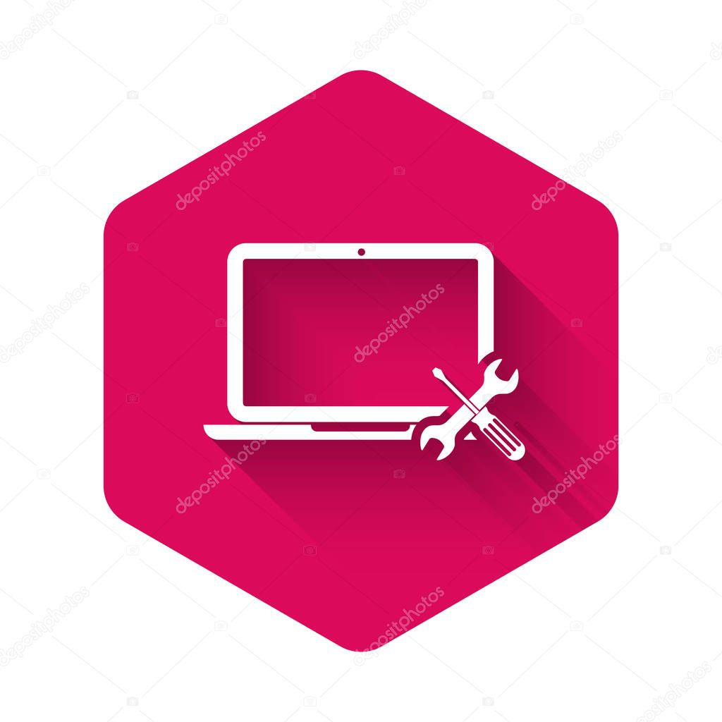 White Laptop with screwdriver and wrench icon isolated with long shadow. Adjusting, service, setting, maintenance, repair, fixing. Pink hexagon button. Vector Illustration
