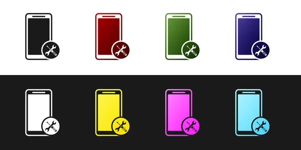 Set Smartphone con destornillador e icono de llave inglesa aislado sobre fondo blanco y negro. Ajuste, servicio, ajuste, mantenimiento, reparación, fijación. Ilustración vectorial — Vector de stock