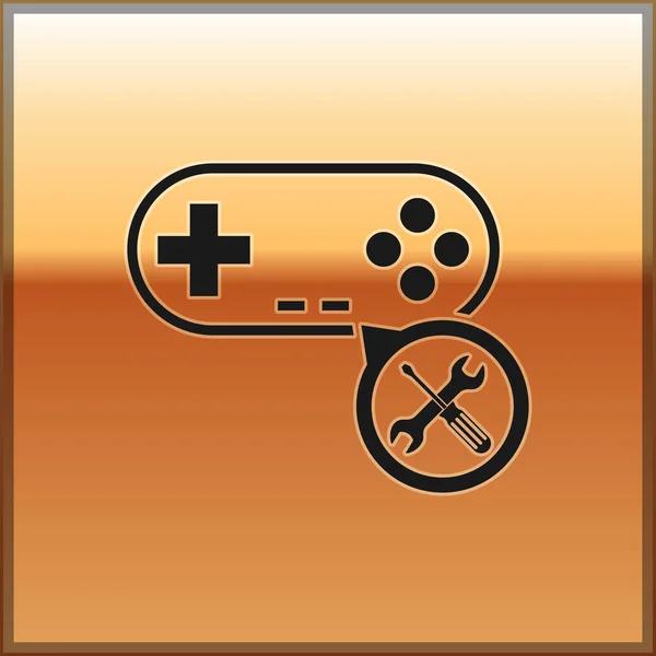 Gamepad Negro con destornillador e icono de llave aislada sobre fondo dorado. Ajuste, servicio, ajuste, mantenimiento, reparación, fijación. Ilustración vectorial — Vector de stock