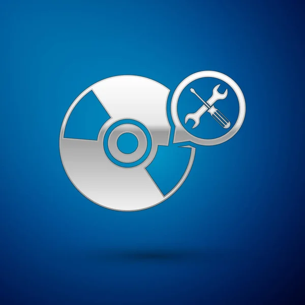 Disco de CD o DVD plateado con destornillador e icono de llave inglesa aislado sobre fondo azul. Ajuste, servicio, ajuste, mantenimiento, reparación, fijación. Ilustración vectorial — Vector de stock