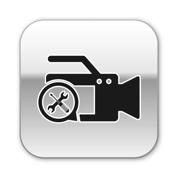 Black Video camera with screwdriver and wrench icon isolated on white background. Adjusting, service, setting, maintenance, repair, fixing. Silver square button. Vector Illustration — Stock Vector